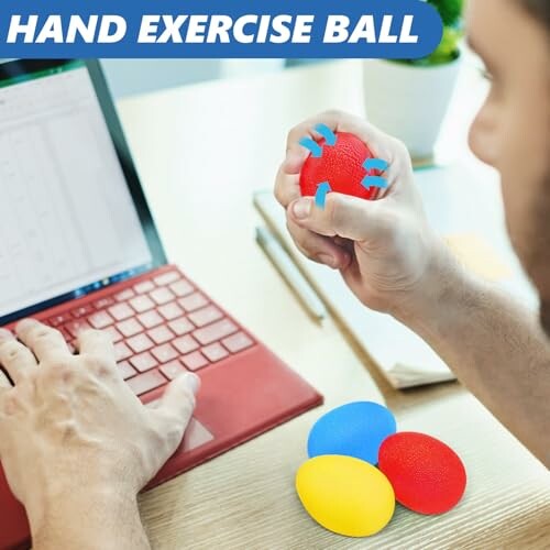 Person using a hand exercise ball near a laptop.