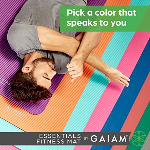 Man resting on colorful yoga mats with text 'Pick a color that speaks to you'.